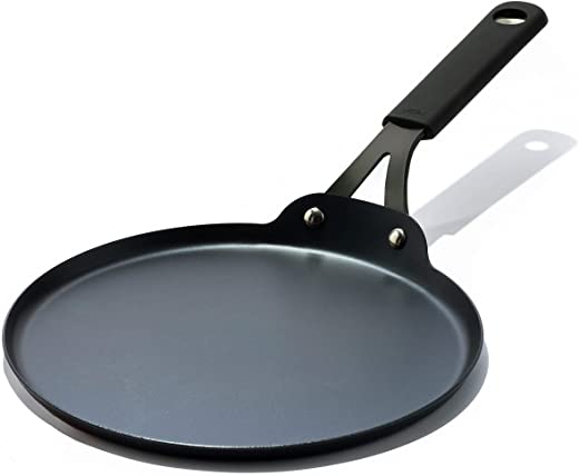 OXO Obsidian Pre-Seasoned Carbon Steel, 10″ Crepe and Pancake Griddle Pan with Removable Silicone Handle Holder, Induction, Oven Safe, Black